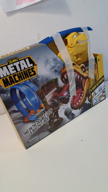 Metal Machines T-rex Attack Pista Con Veicolo  